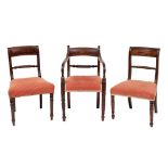 A harlequin set of five Regency mahogany dining chairs:,