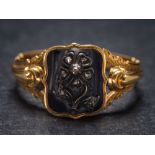 A mid 19th Century black enamelled gold and diamond mourning ring: with rose diamond-set