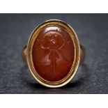 A Roman cornelian intaglio mounted seal ring: the intaglio possibly depicting Ceres,