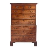 A George III mahogany chest on chest:, the upper part with a moulded cornice,