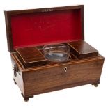 A Regency mahogany and boxwood strung tea caddy: of sarcophagus outline,