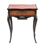 A 19th Century French ebonised, boulle work and gilt metal mounted work table:,