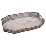 A late Victorian/ Edwardian silver plated serving tray: of rectangular outline with canted corners