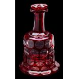 A Bohemian ruby flashed decanter: of mallet shaped form with petal base and raised octagonal neck,