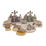 A group of 19th century porcelain and porcelainious sheep models and groups with naturalistic