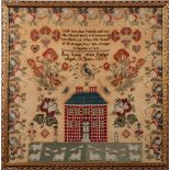 A 19th century woolwork sampler: with central verse and figures beside a mansion house with a