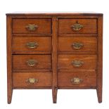 A 19th Century mahogany rectangular chest:, containing eight short drawers, having pine sides,