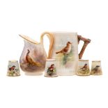 A small group of Royal Worcester miniature bird painted pieces: comprising four thimbles and a