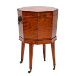 A Regency satinwood and inlaid octagonal wine cooler:, crossbanded in rosewood,