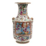 A pair of Chinese Canton famille rose vases: each with cylindrical body and waisted neck with gilt