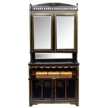 A late 19th Century Aesthetic Movement ebonised and gilt decorated secretaire bookcase: the upper