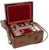 A Victorian coromandel and brass strung travelling toiletry box: the hinged lid enclosing a fitted