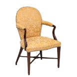 A George III mahogany open armchair in the Hepplewhite taste:,