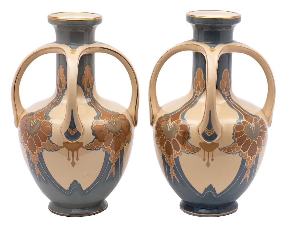 A pair of Villeroy Boch pottery vases: of footed oviform with raised neck and four handles