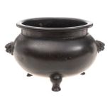 A small Chinese silver wire-inlaid bronze tripod censer: of globular form with waisted neck and