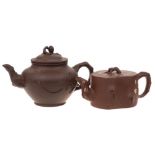Two Chinese Yixing stoneware teapots: one of dark brown hue with rustic handle,