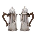 A pair of Edward VII silver café au lait pots, maker Wakely & Wheeler, London,
