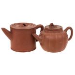 Two Chinese Yixing stoneware teapots: both of light brown hue,