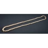 A cultured pearl single-string necklace: the individually knotted pearls graduating from 4.