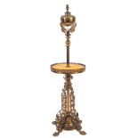 A late Victorian brass telescopic standard oil lamp:, adapted for electric light,