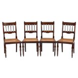 Campaign Furniture A set of four early 19th Century rosewood dining chairs: the backs with curved