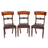 A set of six Victorian carved mahogany dining chairs:,