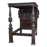 A 19th Century carved oak four poster bed in the Elizabethan taste:,
