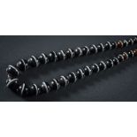 A banded agate bead single-string necklace: the beads graduated from 6mm to 16mm and on black