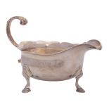 A George II silver sauceboat, maker Fuller White, London, 1748: of traditional design,
