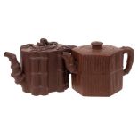 Two Chinese Yixing stoneware teapots: one of dark brown hue and with bamboo moulded decoration and