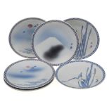 A set of six Japanese porcelain plates: painted with irises,