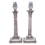 A pair of Edward VII silver Corinthian column candlesticks, maker Thomas A Scott, Sheffield,