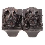 A pair of late 17th/early 18th century carved oak corbels: carved as angel's faces,