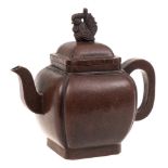 A Chinese Yixing stoneware teapot: of dark brown burnished finish and of canted square profile,