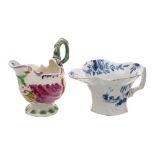 A First Period Worcester polychrome 'Dolphin Ewer' creamboat and a blue and white creamboat: the