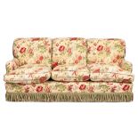 A 'Howard Chairs Ltd' three seat settee and matching armchair:,