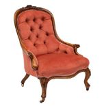 A lady's Victorian carved walnut armchair:,