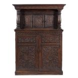 A carved oak court cupboard:,
