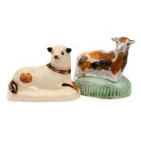 A Bovey Tracey creamware figure of a recumbent lamb and a similar Prattware figure: the first