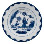 A Bow blue and white 'Golfer and Caddy' pattern plate and a pair of 'lotus and bamboo' octagonal