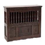 A 19th Century carved oak food cupboard:, in the 17th Century taste,