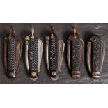 A group of five WWII Regulation Royal Navy pocket knives: one with MOD crows foot dated 1940,