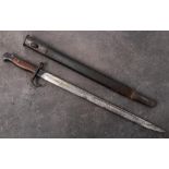 A 1907 pattern bayonet : the straight single edge fullered blade stamped with crown and 'GR' cipher