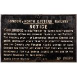 A LNER cast iron bridge weight restriction notice: raised text, marked 'King's Cross Station 0.