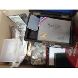 Box of coins, banknotes, medals, loose and in tins.