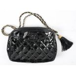 A Vintage 1986-88 Chanel black patent leather quilted evening bag: with 'CC' logo above front