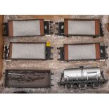 A group of four loose O gauge coal wagons: together with a 4 ton open wagon and a Unigate