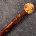 A 19th century American inlaid walking cane: the ivory ball pommel over shaft inlaid 'Liberty' and