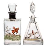 A silver collared glass hunting theme decorated decanter and stopper,