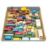A collection of various playworn Dinky vehicles: including No.480 'Kodak' yellow Bedford Van, No.